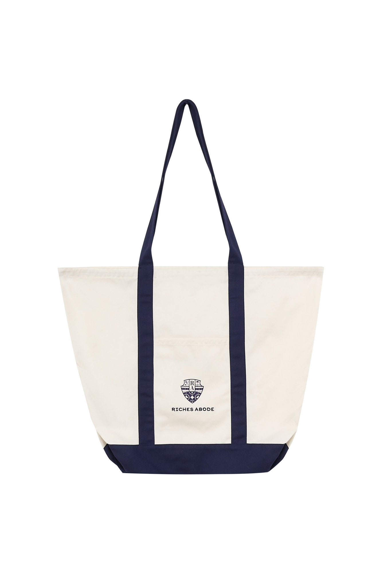Anna tote bag by Riches Abode in a sleek white and navy colorway. Spacious, sustainable, and perfect for daily errands