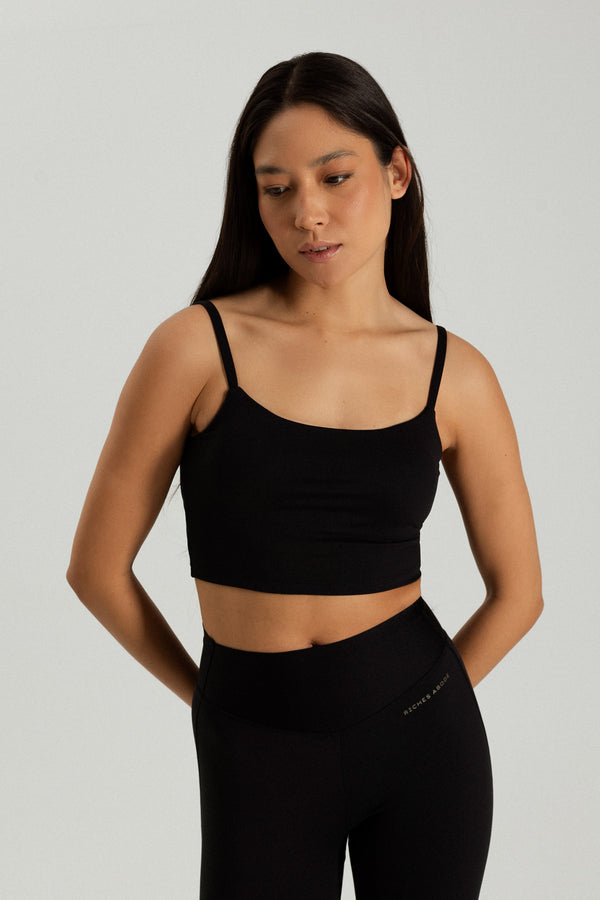 Martina tank bra in black by Riches Abode, crafted for flexibility and comfort with sustainable fabric. Perfect for all-day wear