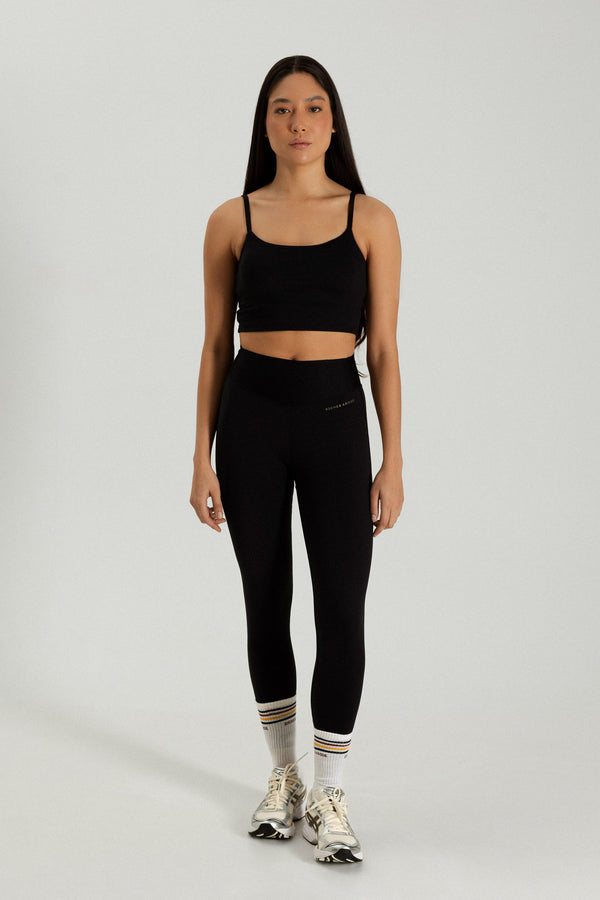 Active set by Riches Abode, featuring a black tank bra and leggings. Made from breathable, eco-conscious fabric for active lifestyles
