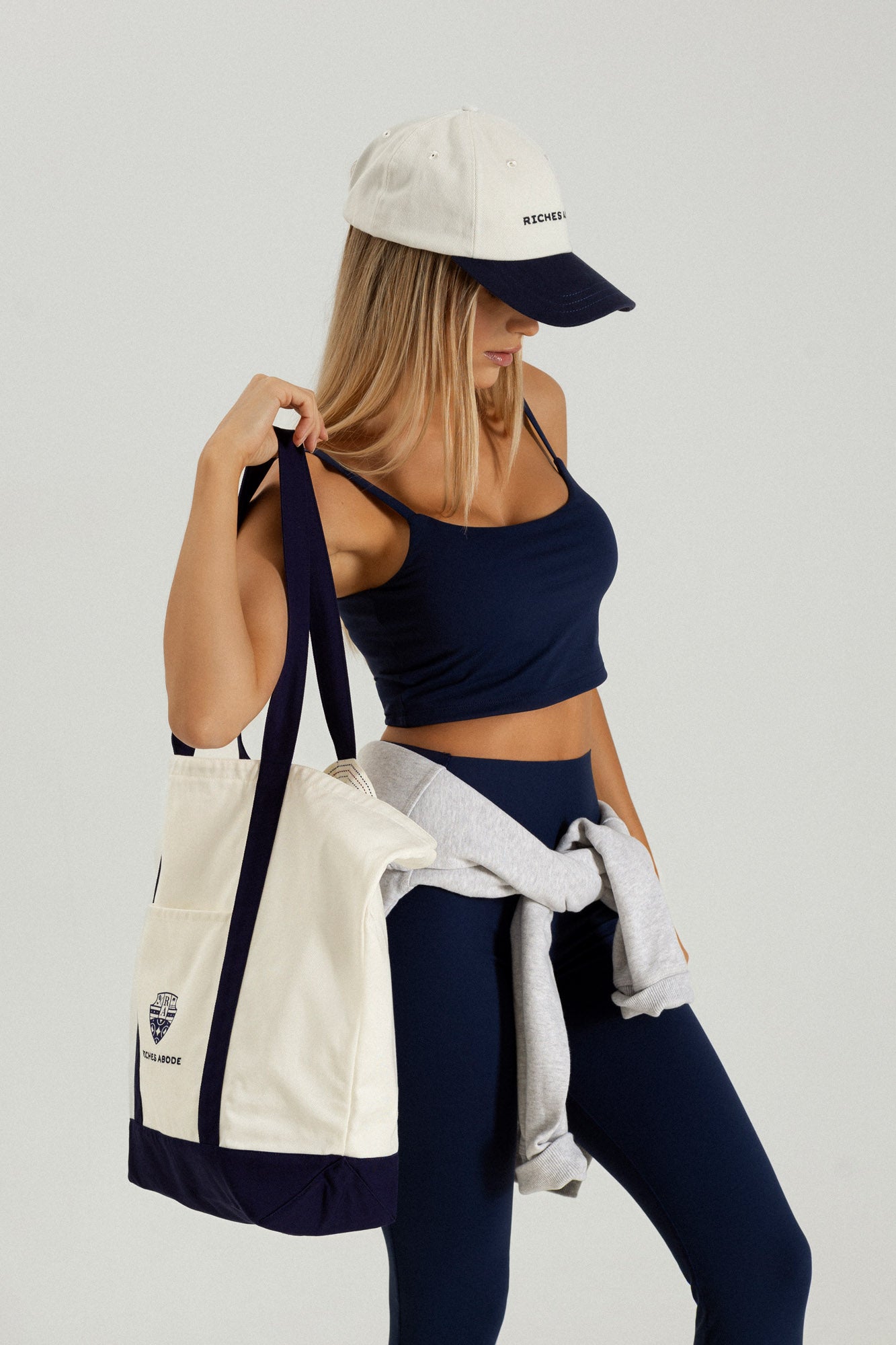 Riches Abode Anna boat tote in white, designed for practicality and timeless style. Made with durable, eco-friendly materials