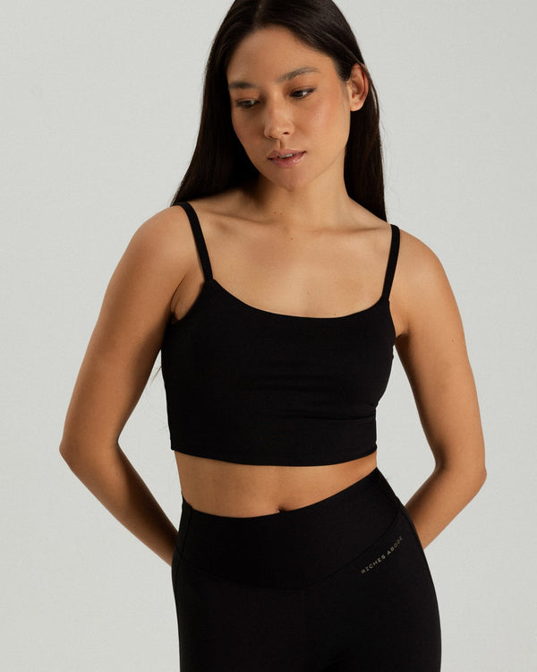 Martina tank bra in black by Riches Abode, crafted for flexibility and comfort with durable fabric. Perfect for all-day wear